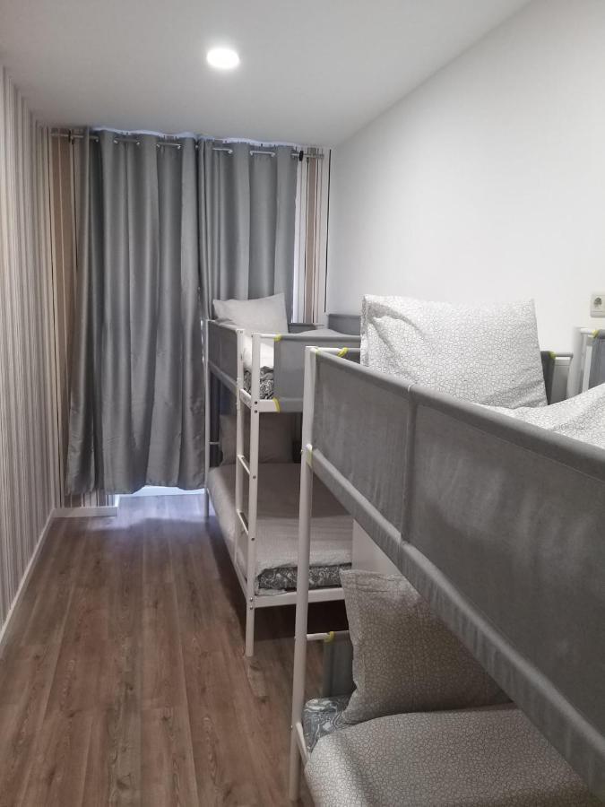 Posto Letto in Dormitorio con 4 Letti