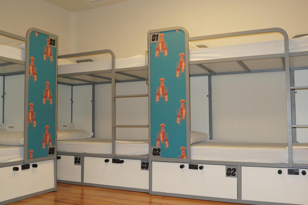 Posto Letto Singolo in Dormitorio Misto con 6 Letti