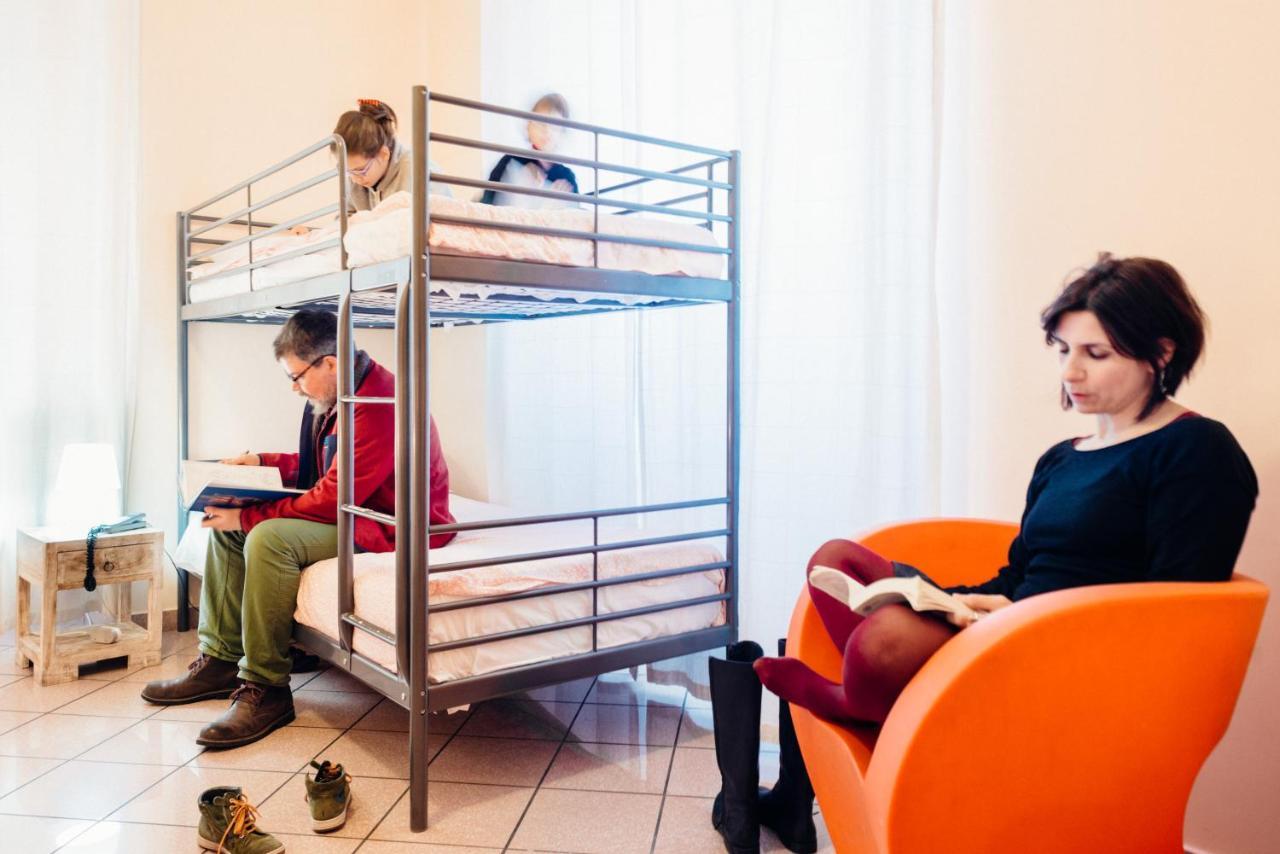 Posto Letto in Dormitorio con 4 Letti