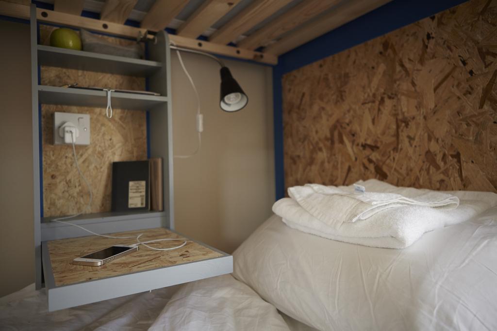 Posto Letto in Dormitorio Misto con 4 Letti e Bagno in Comune
