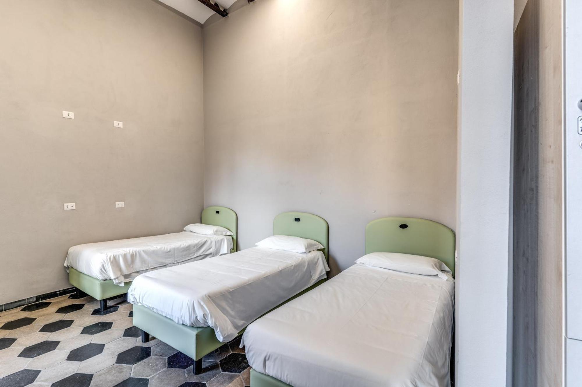 Camera Quadrupla con Bagno in Comune