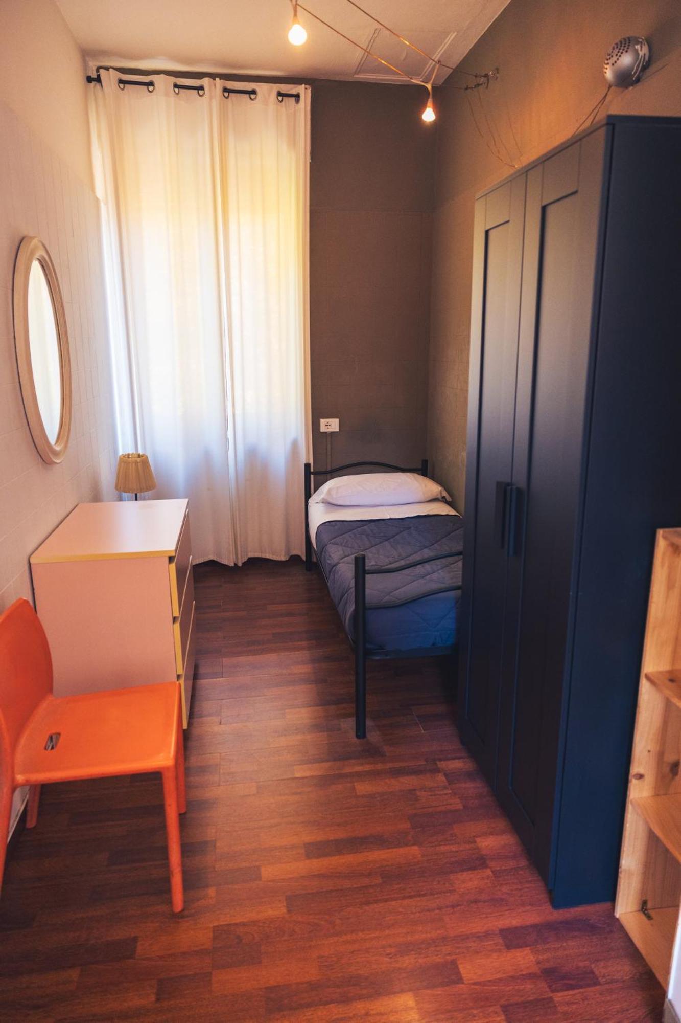 Camera Singola con Bagno in Comune