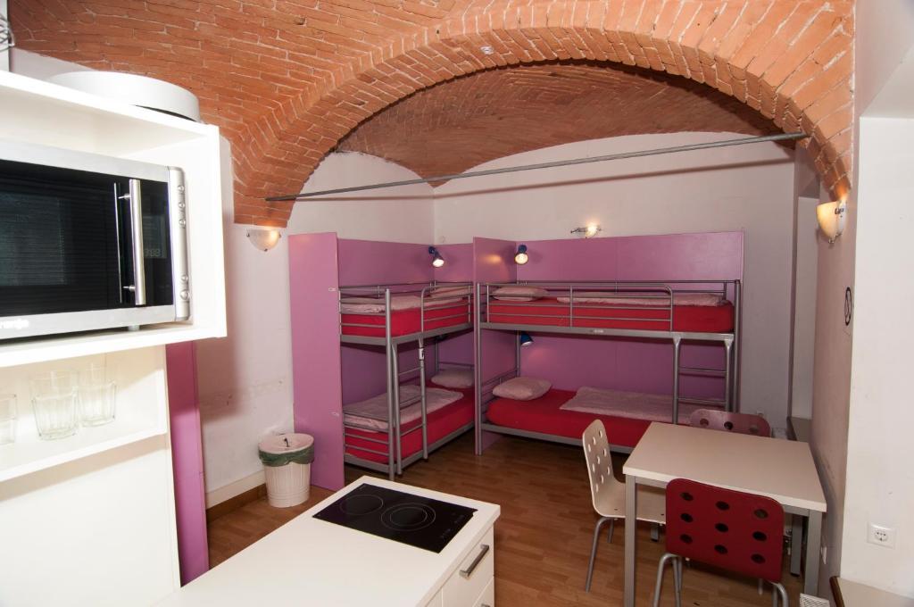 Posto Letto in Dormitorio con 4 Letti