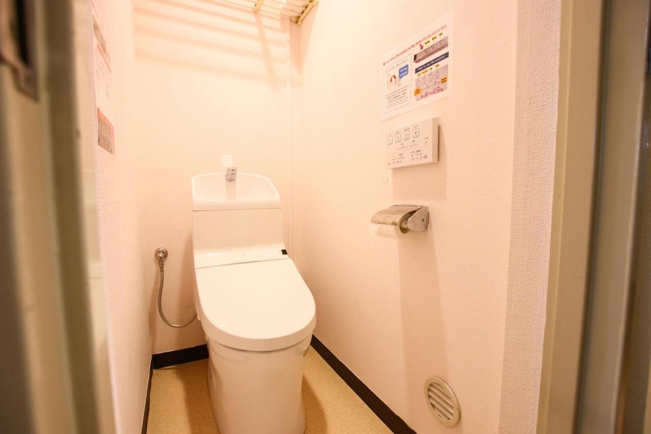 Camera Familiare con Bagno in Comune